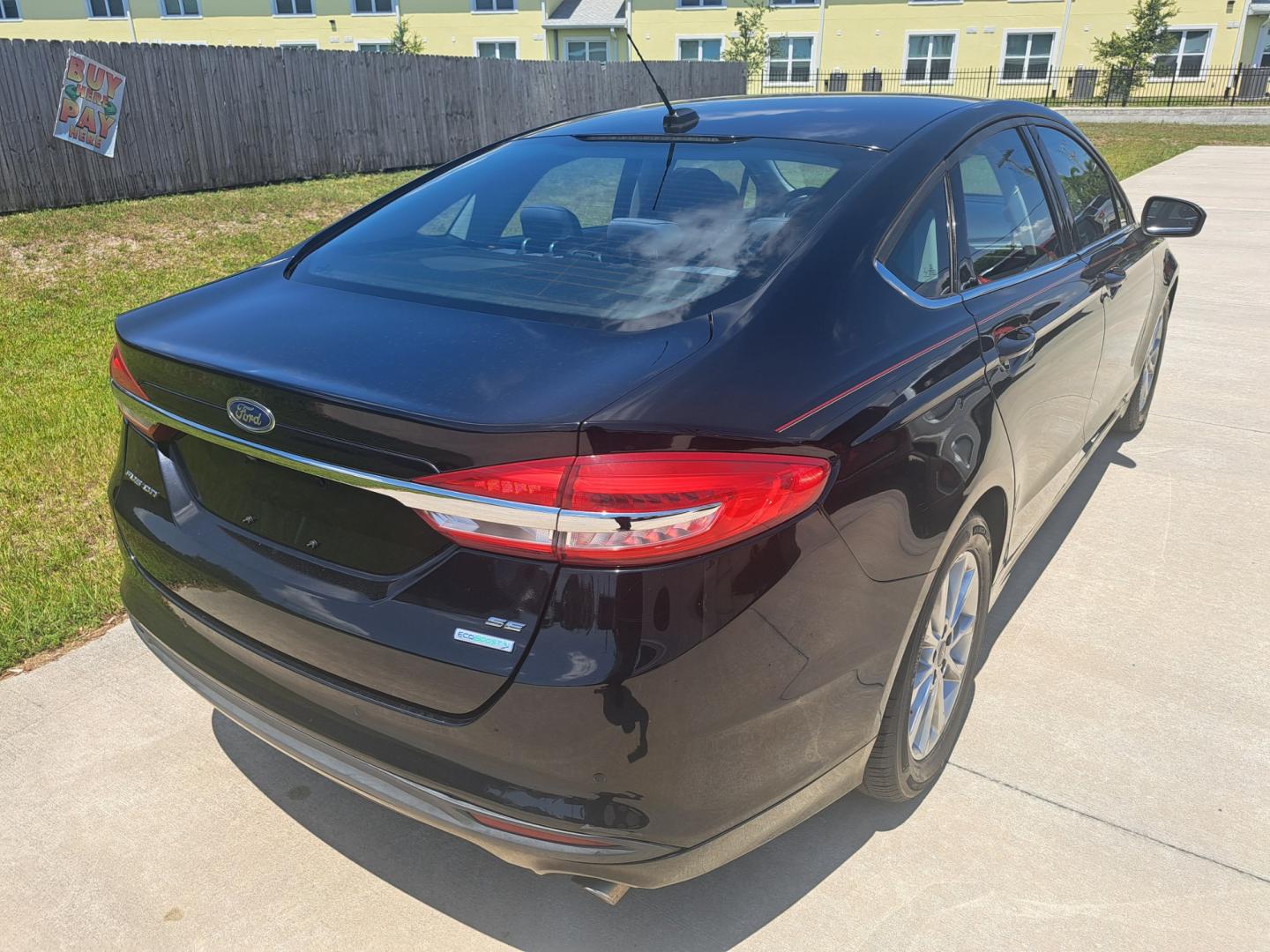 2017 Black /BLACK Ford Fusion SE (3FA6P0HD8HR) with an 1.5L L4 DOHC 16V engine, 6A transmission, located at 1181 Aurora Rd, Melbourne, FL, 32935, (321) 241-1100, 28.132914, -80.639175 - Photo#2